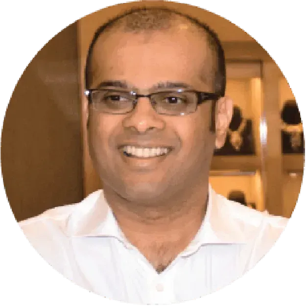 <p style="text-align: justify;"><span style="font-family: Mulish; font-size: 14px;">Ganesh has more than 25 years of domain knowledge, experience and leadership in jewellery retail. He has a Graduate Diploma in Diamonds, Coloured Stones & Gemology from Gemological Institute of America (GIA) coupled with a Finance & Marketing degree from the University of Melbourne & Deakin University in Australia. <a href="https://www.linkedin.com/in/ganeshnarayan?utm_source=share&utm_campaign=share_via&utm_content=profile&utm_medium=ios_app"><img src="https://img.icons8.com/?size=100&id=xuvGCOXi8Wyg&format=png&color=000000" alt="LinkedIn" width="23" height="23"></a></span></p>